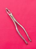 Offset Wolf Tooth Forceps 7″